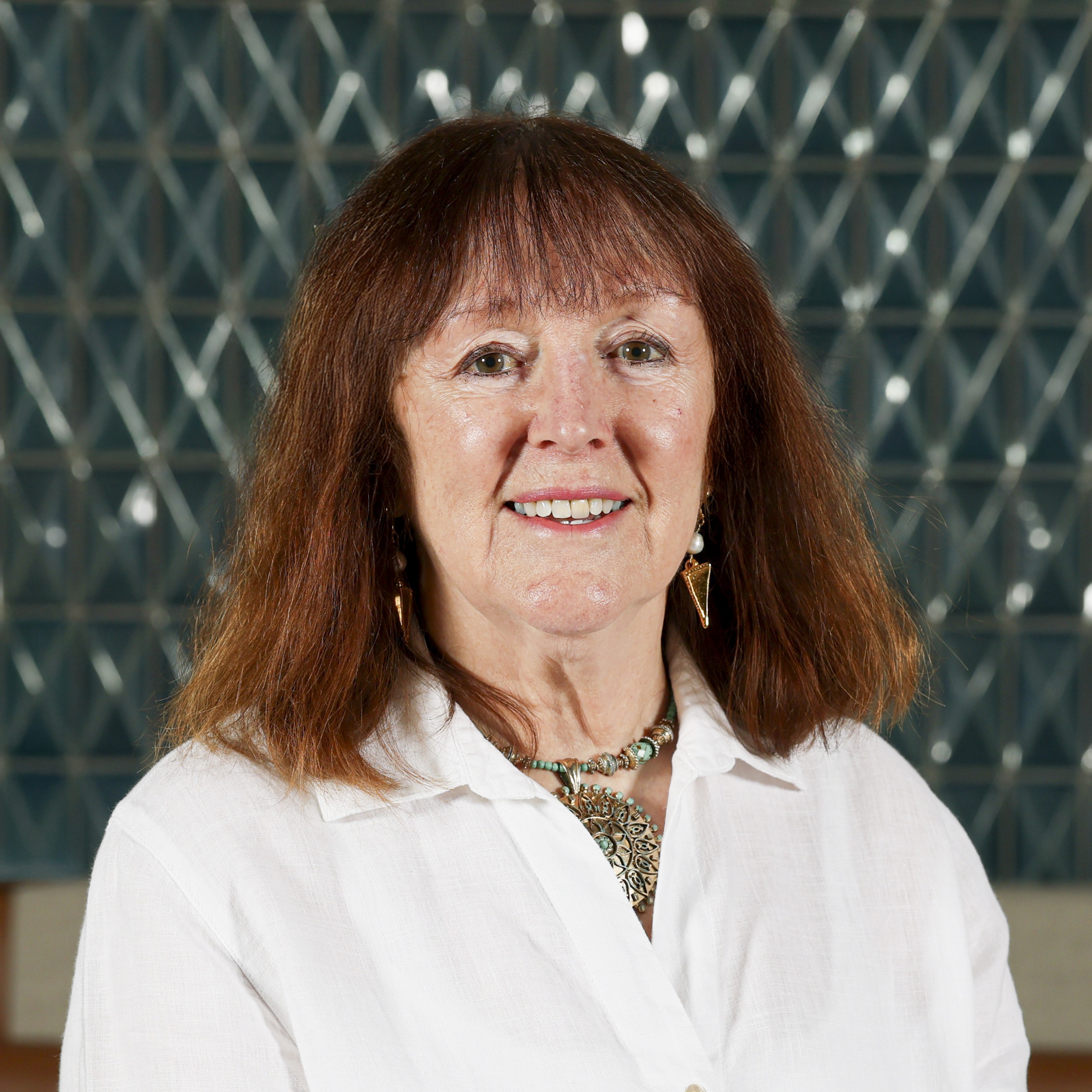 Headshot of Dorcas Batstone, OBE